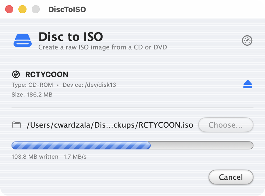 DiscToISO in Retro Mode: a pinstriped Aqua window with glossy gel buttons and a striped barber-pole progress bar.
